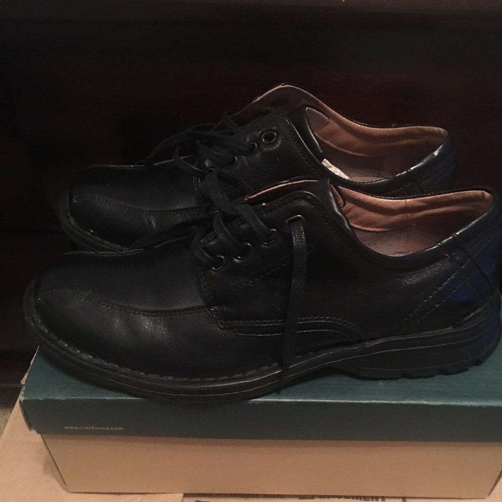Black leather Clark’s oxfords